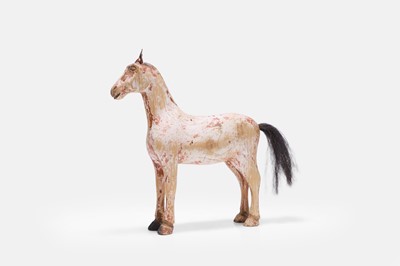 Lot 622 - A wooden folk art horse figure
