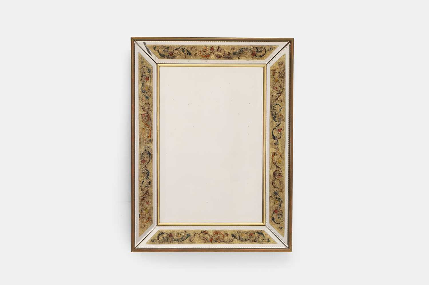 Lot 67 - A verre églomisé wall mirror