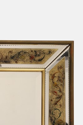 Lot 67 - A verre églomisé wall mirror