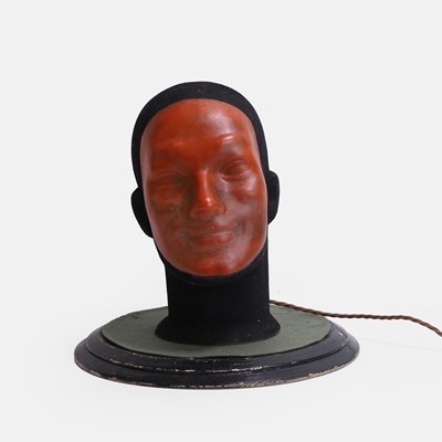 Lot 164 - An unusual and unsettling illuminated shop display