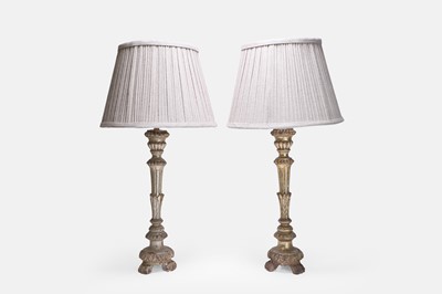 Lot 368 - A pair of rococo giltwood candlestick lamps