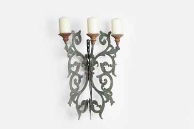 Lot 28 - A pair of patinated pierced-metal wall lights