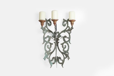 Lot 28 - A pair of patinated pierced-metal wall lights