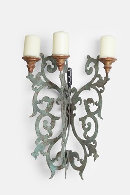 Lot 28 - A pair of patinated pierced-metal wall lights