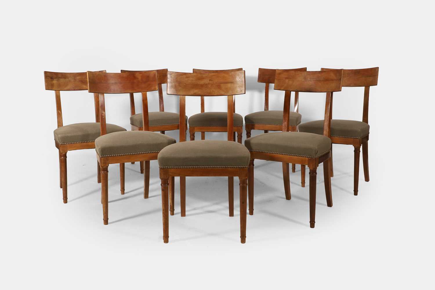 Lot 92 - A set of eight beech klismos dining chairs
