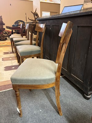 Lot 92 - A set of eight beech klismos dining chairs