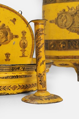 Lot 69 - A toleware basin, cistern and candlestick