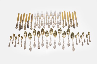 Lot 86 - A silver-gilt flatware service