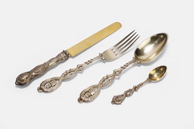 Lot 86 - A silver-gilt flatware service