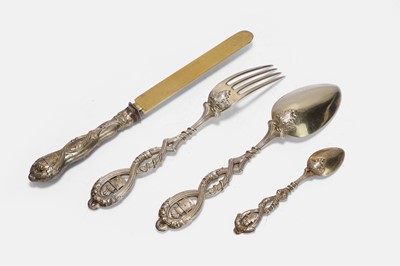 Lot 86 - A silver-gilt flatware service