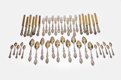 Lot 86 - A silver-gilt flatware service