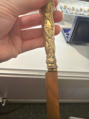 Lot 86 - A silver-gilt flatware service