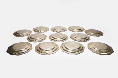 Lot 87 - A set of twelve silver-gilt plates