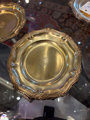 Lot 87 - A set of twelve silver-gilt plates