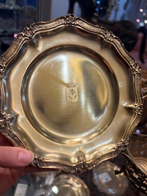 Lot 87 - A set of twelve silver-gilt plates
