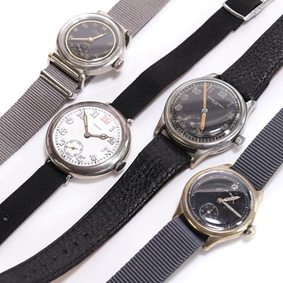 Lot 480 - A group of four 20th century stainless steel military watches