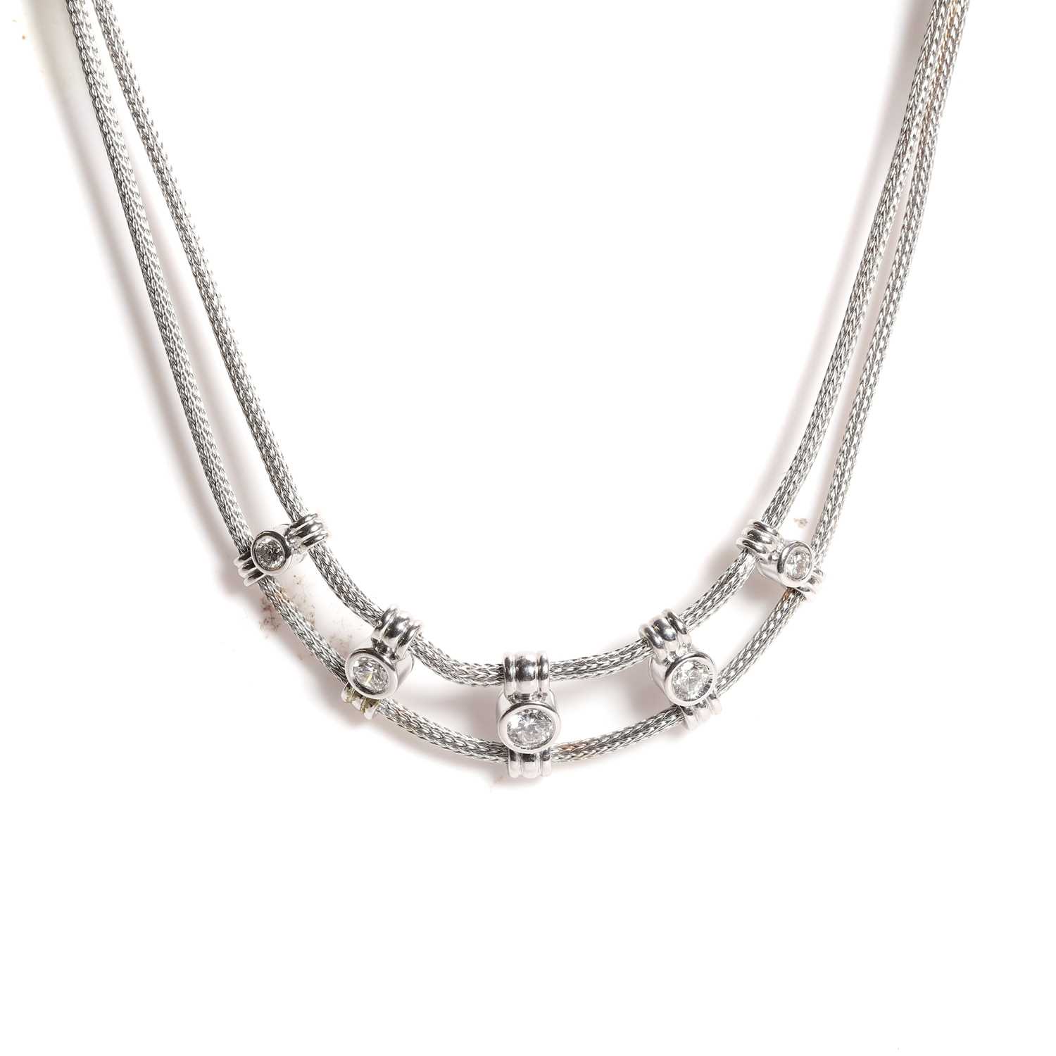 Lot 78 - A double row diamond set choker