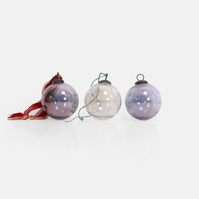 Lot 61 - A pair of lustred clear glass witches balls or ornaments