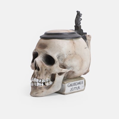 Lot 114A - A novelty porcelain 'skull' beer stein and cover