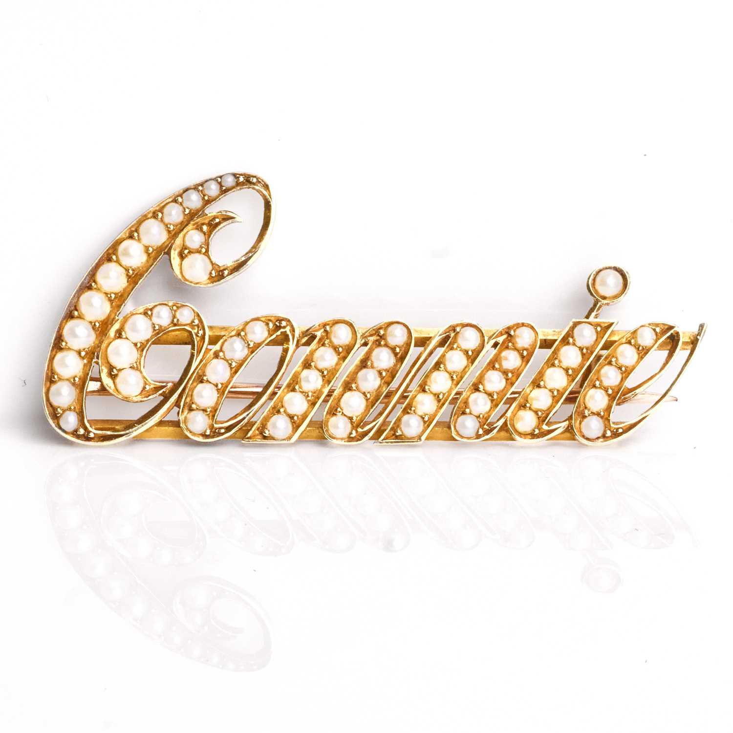 Lot 43 - An early 20th-century split pearl bar brooch