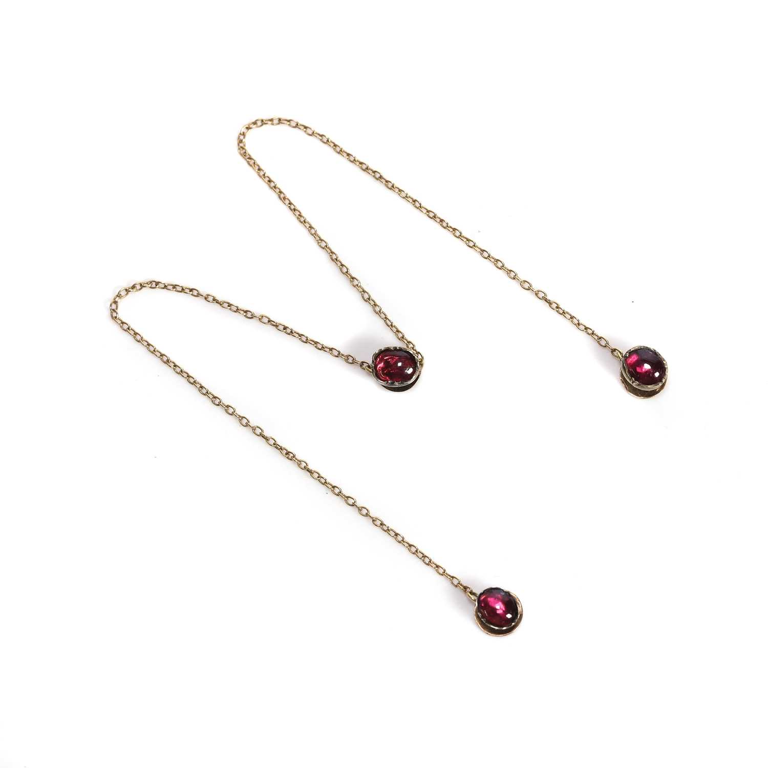 Lot 29 - Three antique garnet dress studs on chain