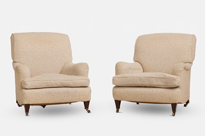 Lot 174 - A pair of upholstered armchairs in the style of Howard & Sons