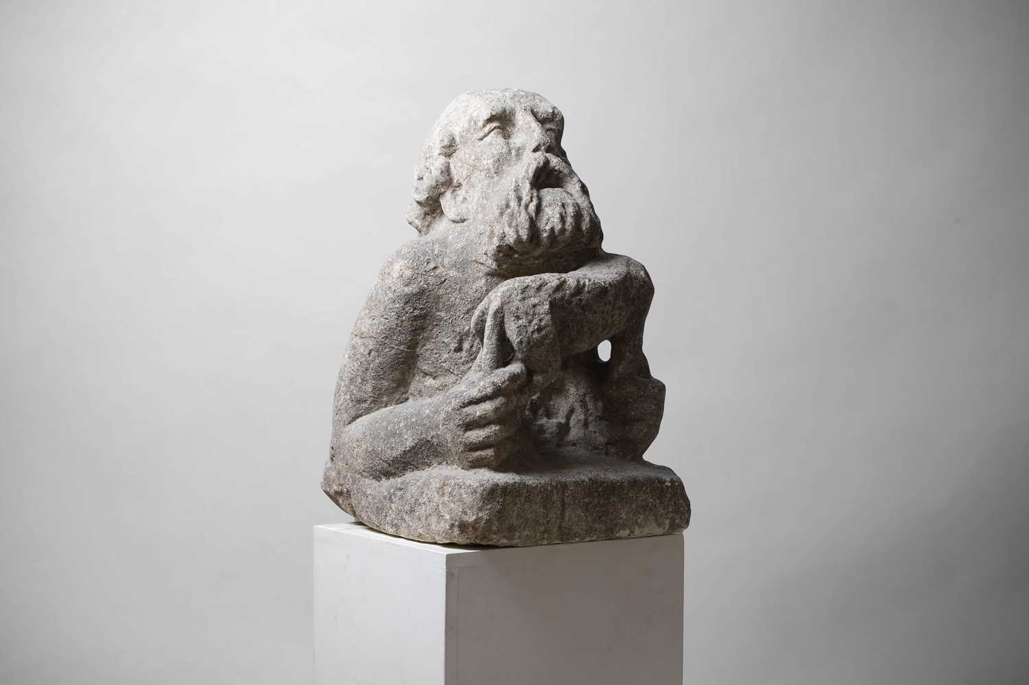 Lot 23 - A Medieval carved stone corbel of a saint