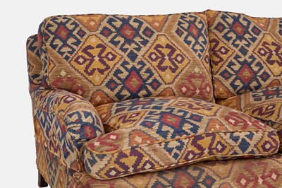Lot 79 - An upholstered two-seater sofa in the Howard & Sons style