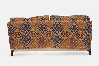 Lot 79 - An upholstered two-seater sofa in the Howard & Sons style