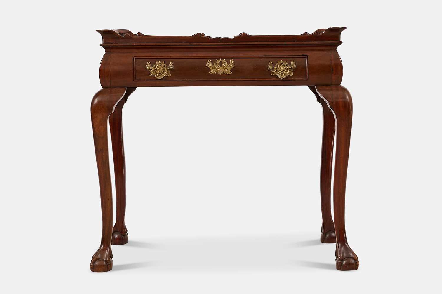 Lot 401 - A mahogany silver table