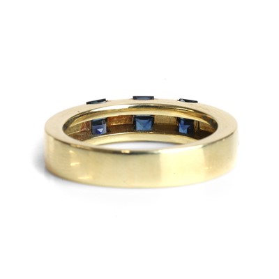 Lot 80 - A sapphire set band ring