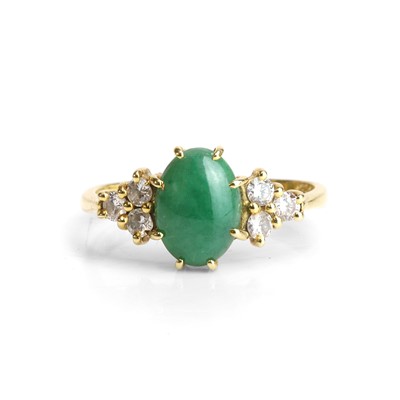 Lot 92 - An 18ct gold jade and diamond ring