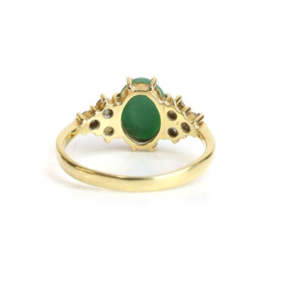 Lot 92 - An 18ct gold jade and diamond ring