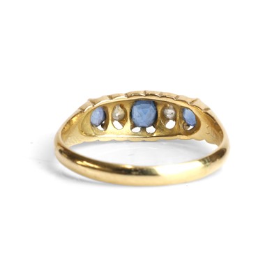 Lot 32 - An Edwardian 18ct gold sapphire and diamond ring