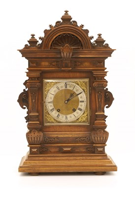 Lot 203 - A German walnut cased mantel clock