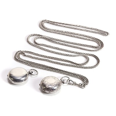 Lot 364 - A silver coin holder on a long chain and a loose silver coin holder