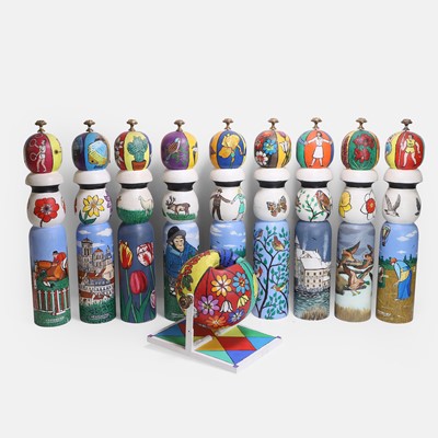 Lot 491 - A set of nine folk art skittles