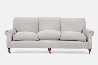 Lot 127 - A three-seater sofa in the style of George Smith