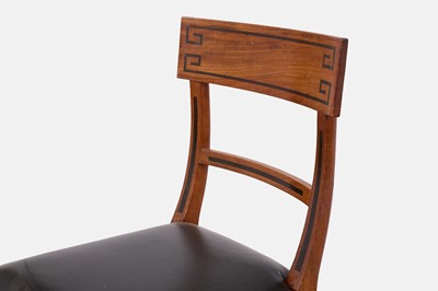 Lot 216 - A set of eight Regency mahogany klismos dining chairs