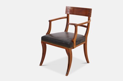 Lot 216 - A set of eight Regency mahogany klismos dining chairs