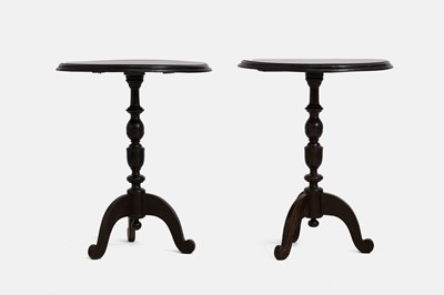 Lot 326 - A pair of ebony side tables