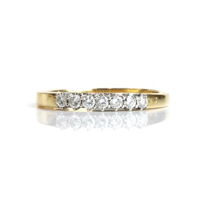 Lot 70 - A diamond half eternity ring