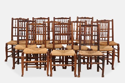 Lot 190 - A set of twelve vernacular oak, ash and elm harlequin dining chairs
