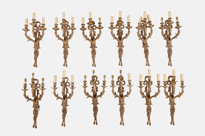 Lot 376 - A set of twelve Louis XVI-style ormolu wall sconces