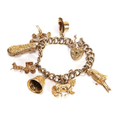 Lot 357 - A 9ct gold charm bracelet