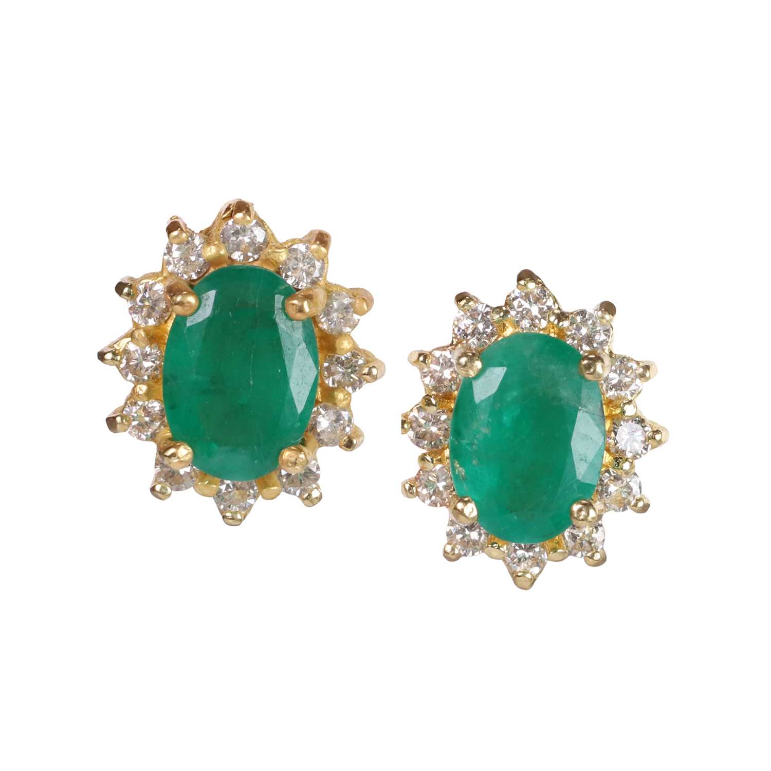 Lot 90 - A pair of emerald and diamond cluster earrings