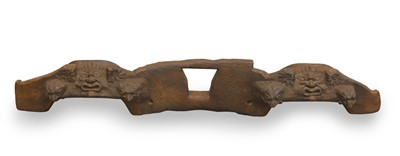Lot 303 - A decoratively carved yoke
