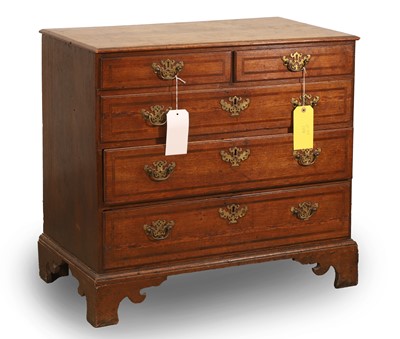 Lot 503 - A George III oak and crossbanded chest of two short over three long drawers