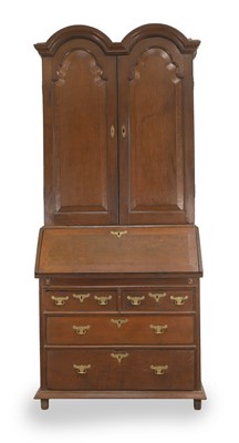 Lot 544 - An oak double top bureau bookcase