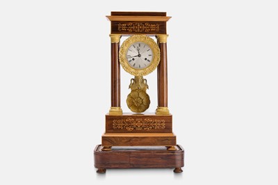 Lot 68 - A Napoleon III rosewood, boxwood and ormolu portico clock